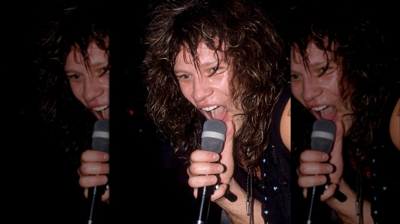 Jon Bon Jovi performing onstage in the '80s