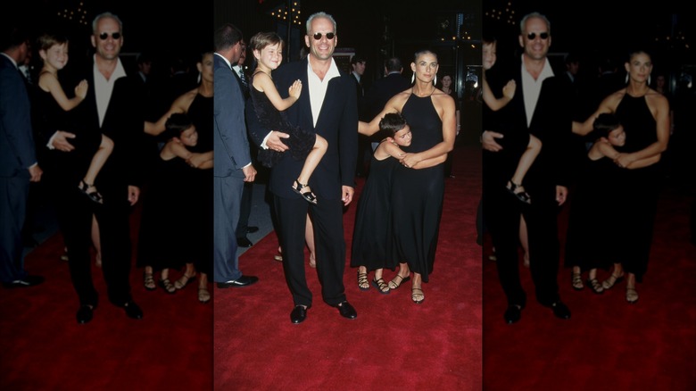 Bruce Willis, Demi Moore, and Rumer and Scout Willis at the premiere of "G.I. Jane."