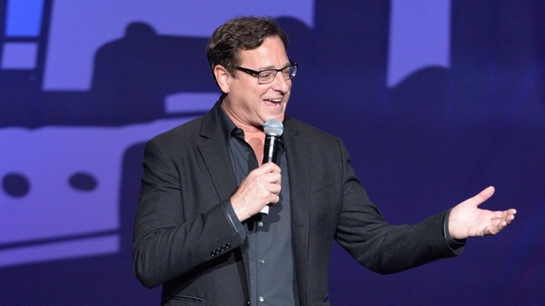 Bob Saget performing standup comedy 