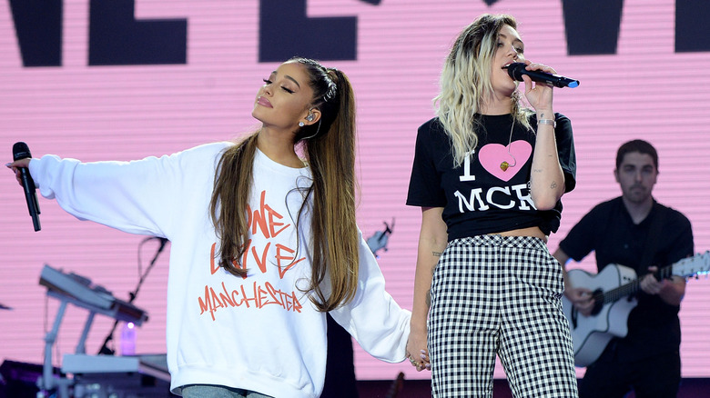 Ariana Grande and Miley Cyrus performing at One Love Manchester