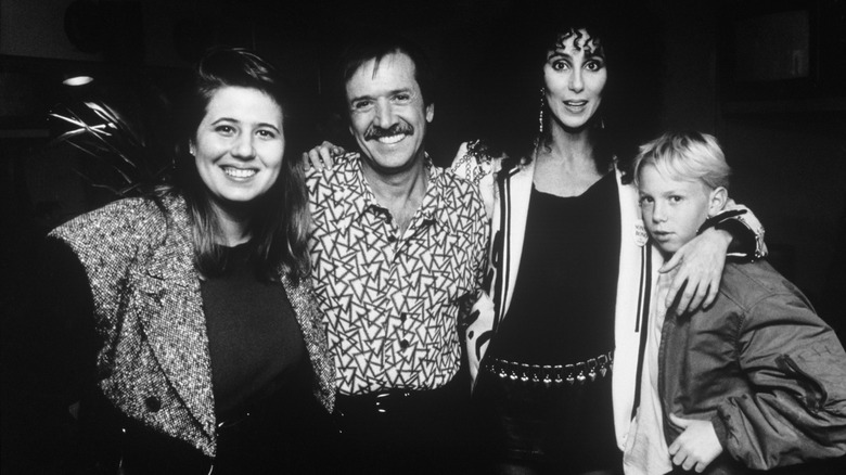 Elijah Blue posing with Cher, Sonny Bono, and Chastity (Chaz) Bono