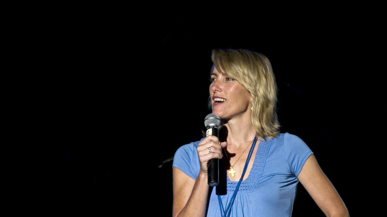 Laura Ingraham speaking at event in blue shirt