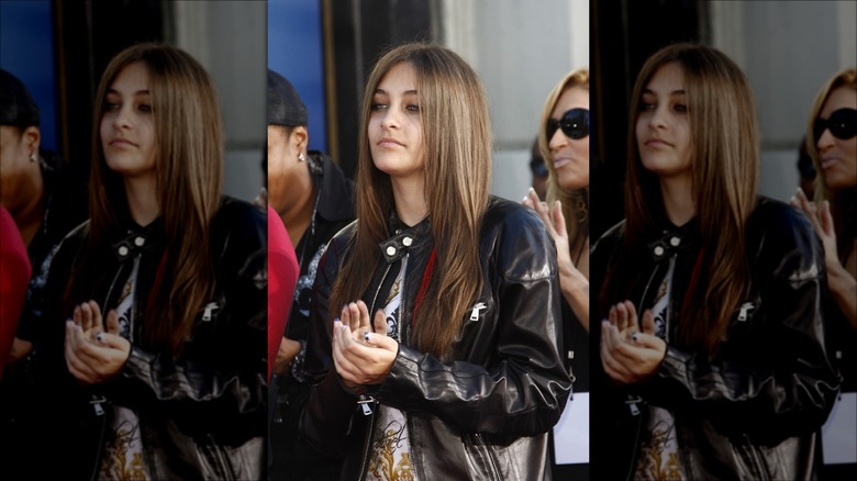 Paris Jackson clapping