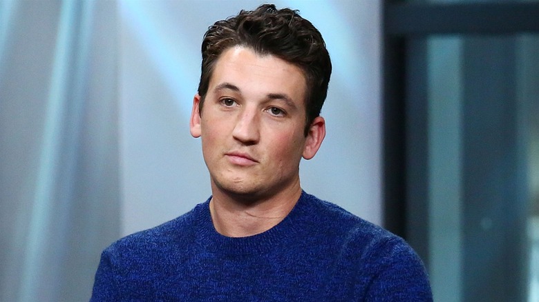 Miles Teller blue sweater