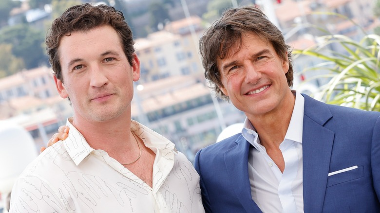 Miles Teller and Tom Cruise