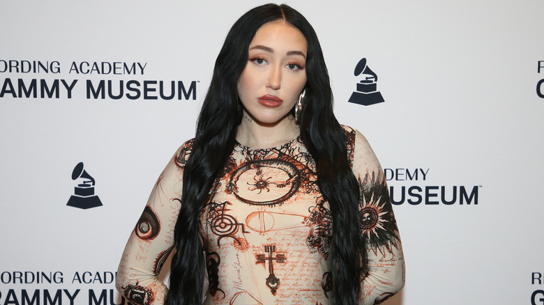 Noah Cyrus posing