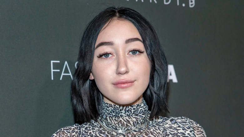 Noah Cyrus posing