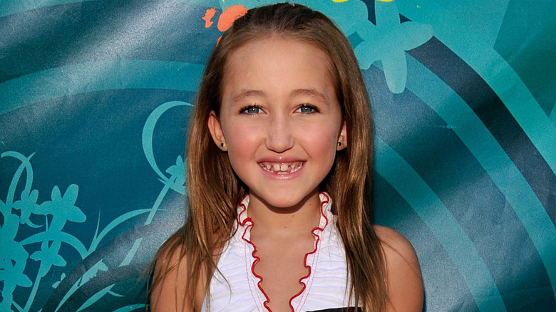 Noah Cyrus smiling