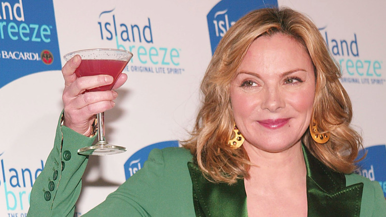 Kim Cattrall with a cocktail