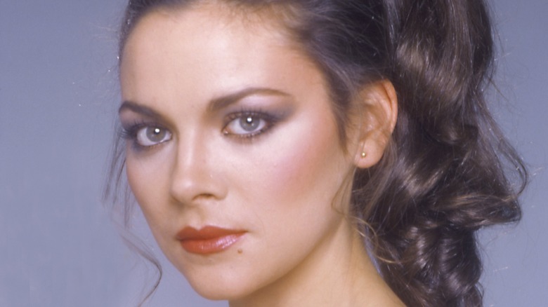 Young Kim Cattrall with a ponytail