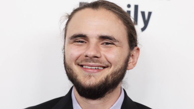 Closeup of Prince Jackson smiling on step-and-repeat