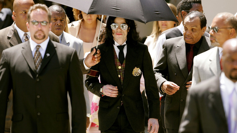 Michael Jackson attending court with his family