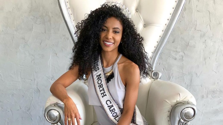 Cheslie Kryst smiling in Miss North Carolina sash