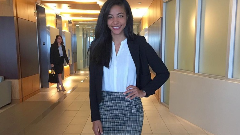 Cheslie Kryst posing in office attire