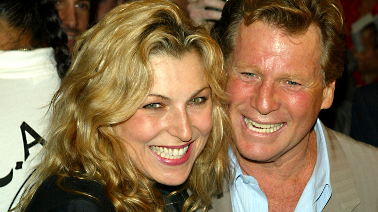 Tatum O'Neal and Ryan O'Neal, both smiling