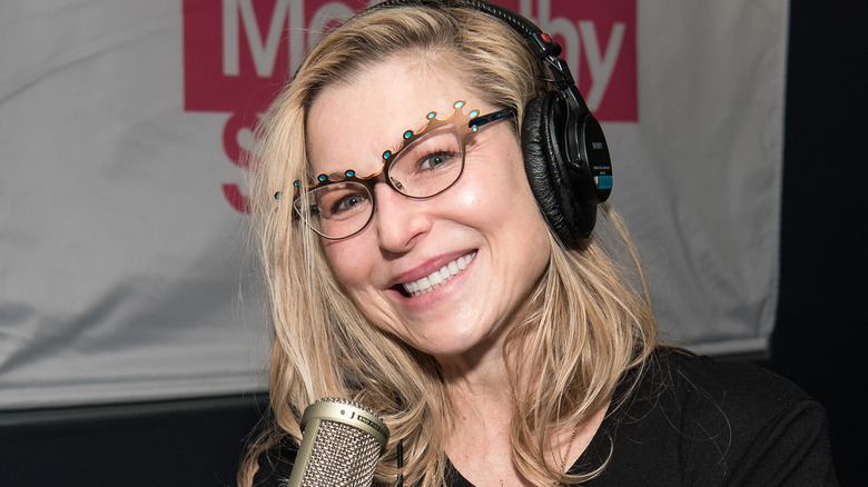 Tatum O'Neal wearing headphones, smiling