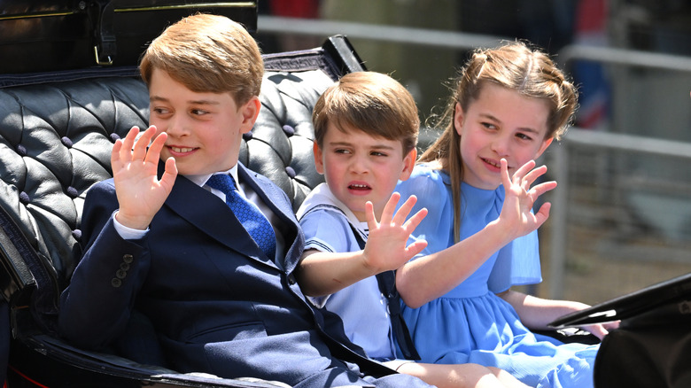 Prince George, Prince Louis, and Princess Charlotte waving