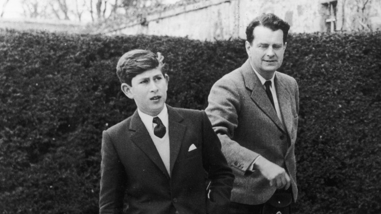 King Charles III wearing a suit at Gordonstoun School