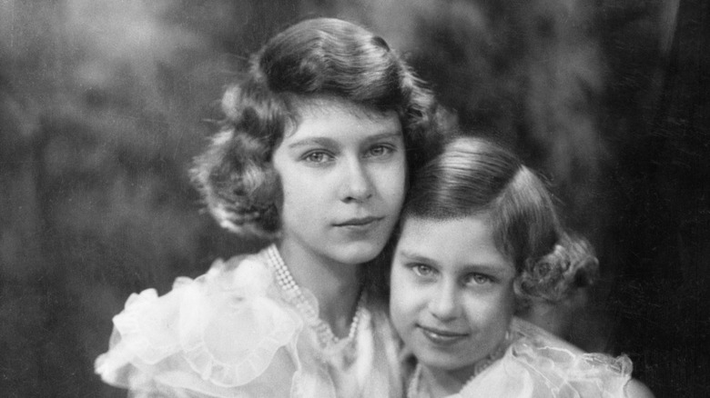 Queen Elizabeth and Princess Margaret posing together