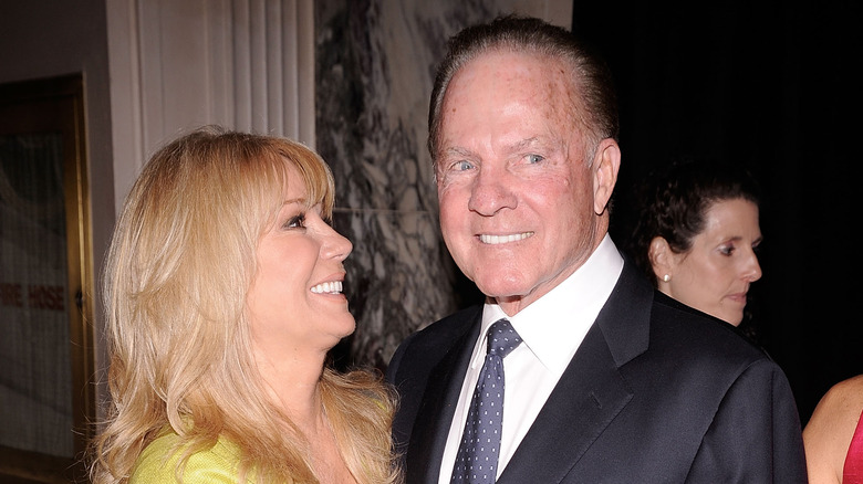 Kathie Lee Gifford embracing her husband