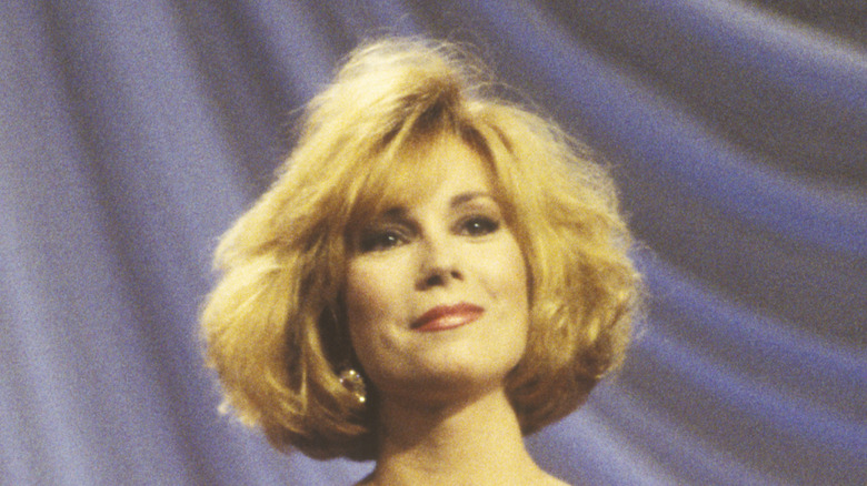 Young Kathie Lee Gifford with big hair