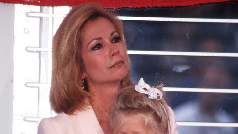 Kathie Lee Gifford holding her daughter