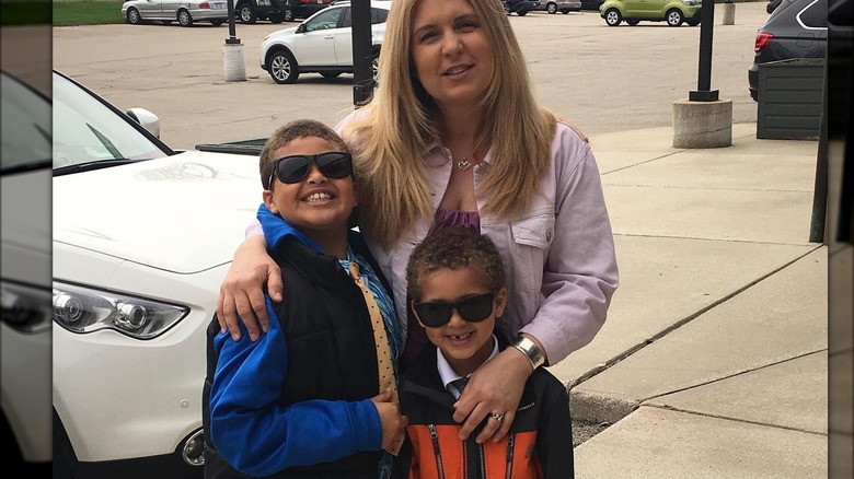 Kelly Robinson and her two kids smiling