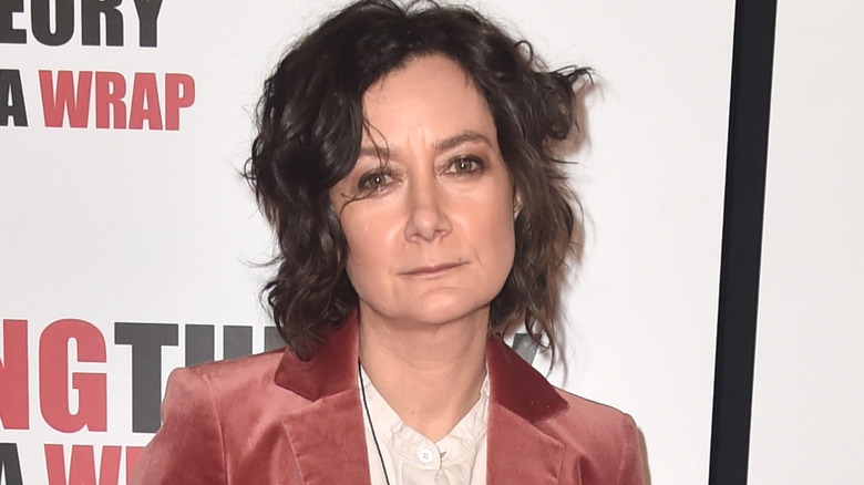 Sara Gilbert posing 