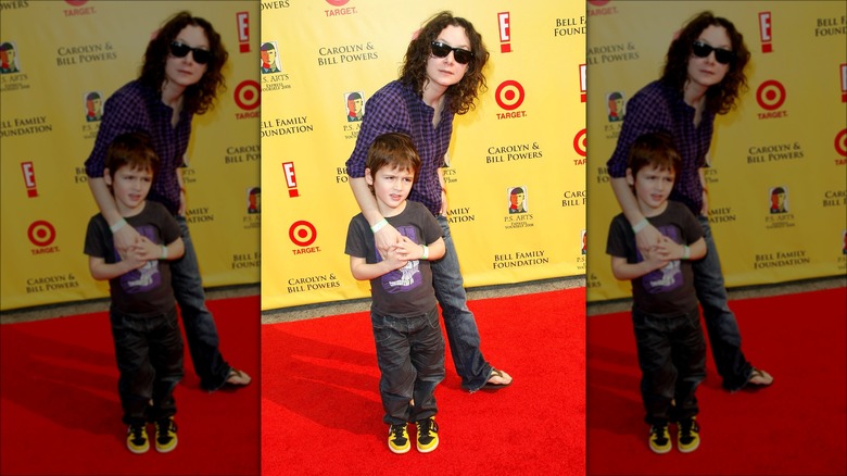 Sara Gilbert posing with her son