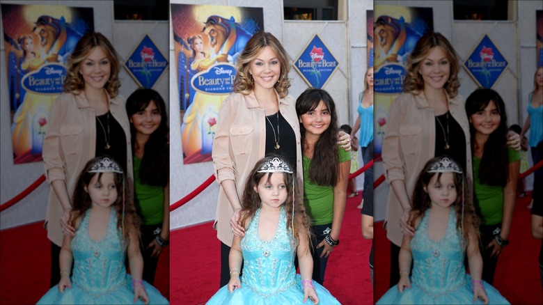 Shanna Moakler posing with her daughters 