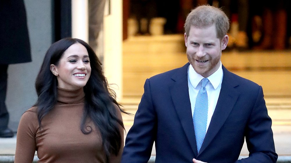 Prince Harry and Meghan, Duchess of Sussex, leaving an event in 2020