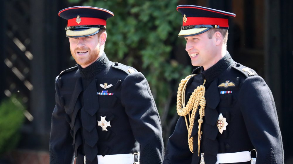 Prince Harry and Prince William attending the former's wedding in 2018
