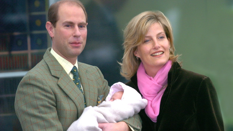 Duke and Duchess of Edinburgh holding baby Louise