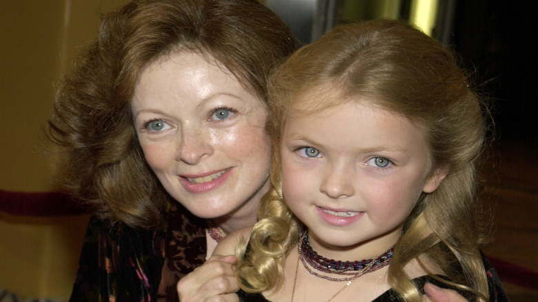 Francis Fisher posing with daughter Francesca Eastwood