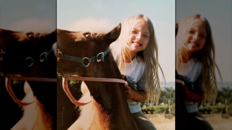 Young Francesca Eastwood riding a horse