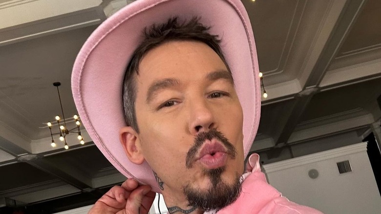 David Bromstad wearing pink hat