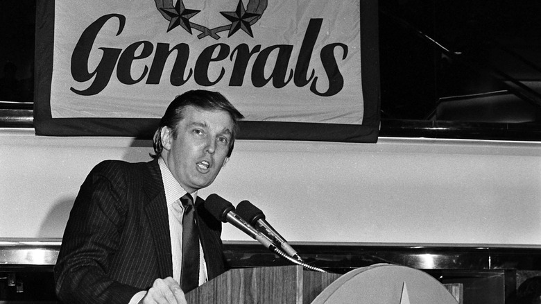 Donald Trump in black-and-white speaking 