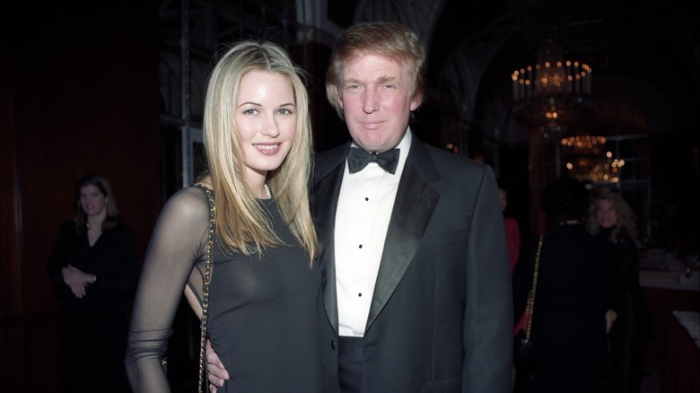 Donald Trump with a blonde model