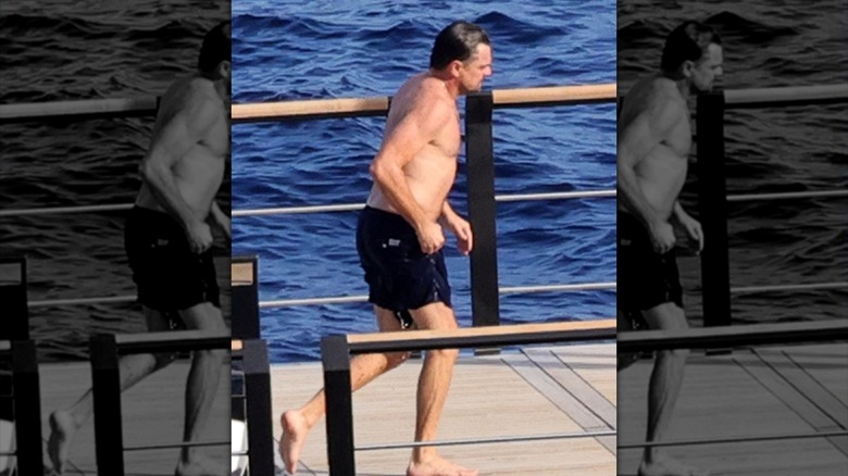 Leonardo DiCaprio walking by water