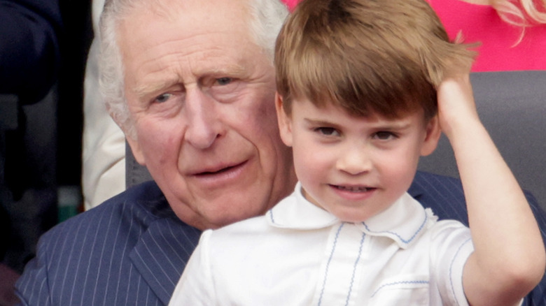 King Charles holding Prince Louis