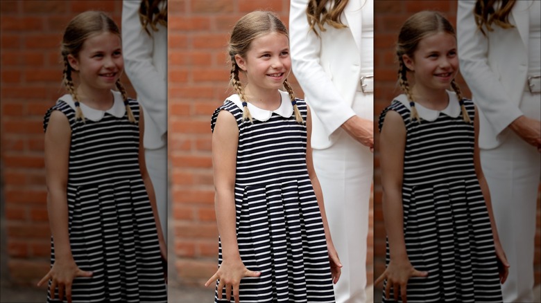 Princess Charlotte smiling in striped dress