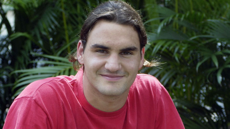 Young Roger Federer posing