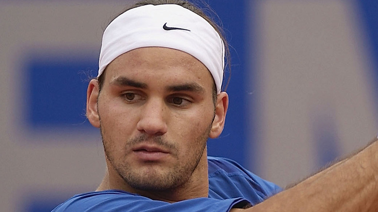 Roger Federer with a sweat band