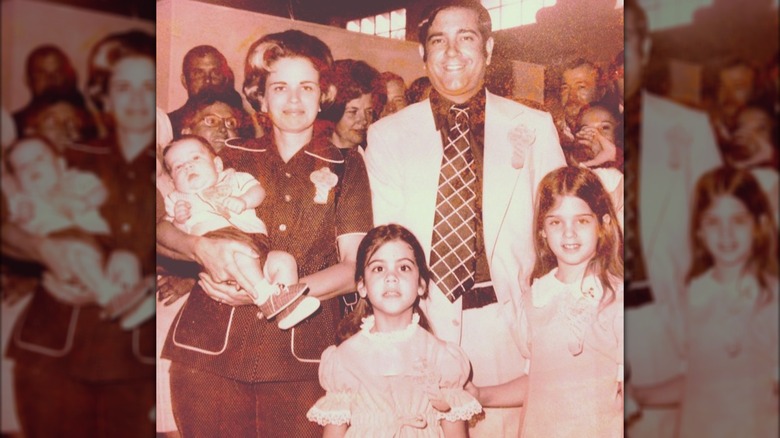 A young Pam Bondi posing with her family