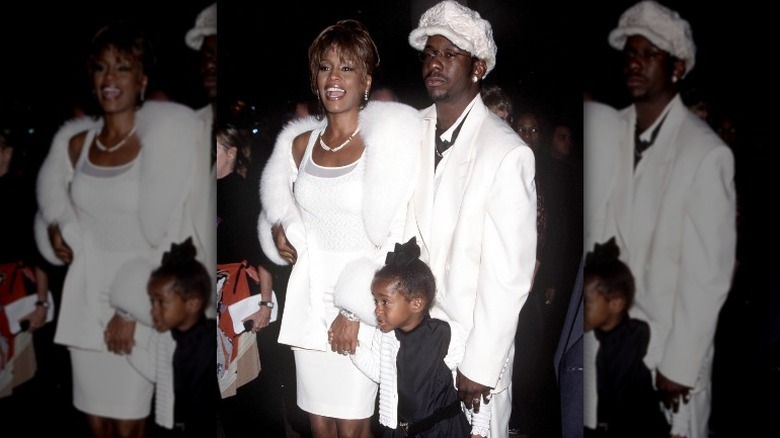 Whitney Houston with her husband and daughter