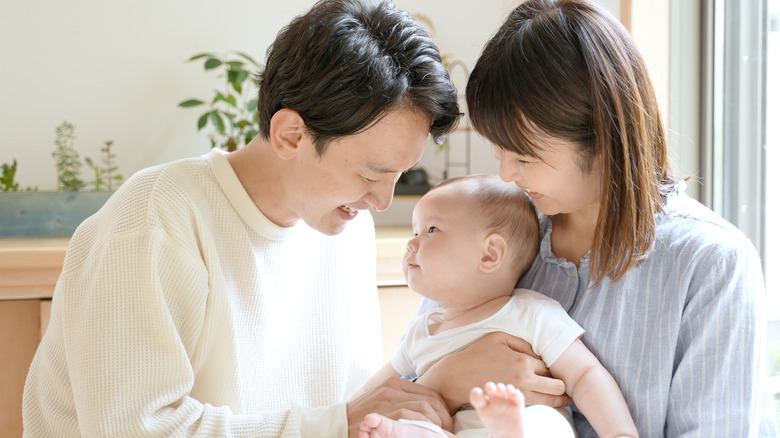 baby with parents 