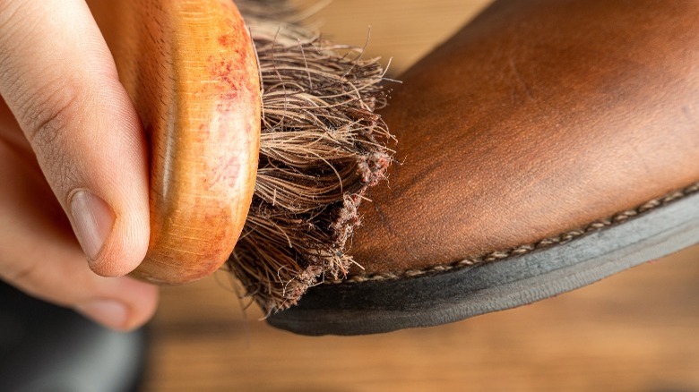 Brushing leather boot