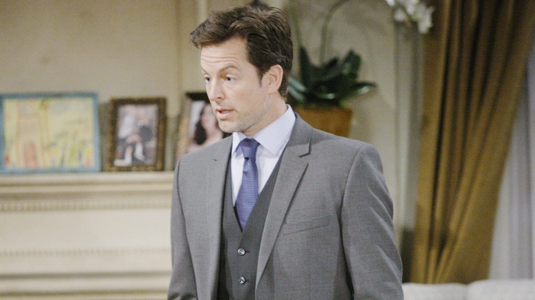 Adam Newman in a grey suit on "Y&R"