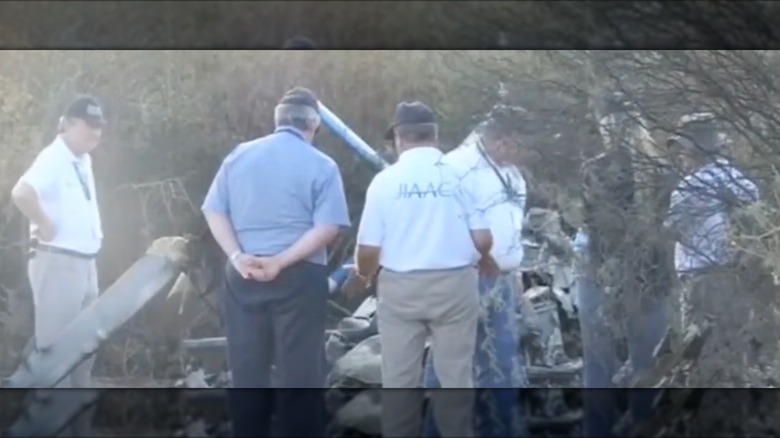 Authorities examine helicopter crash wreckage