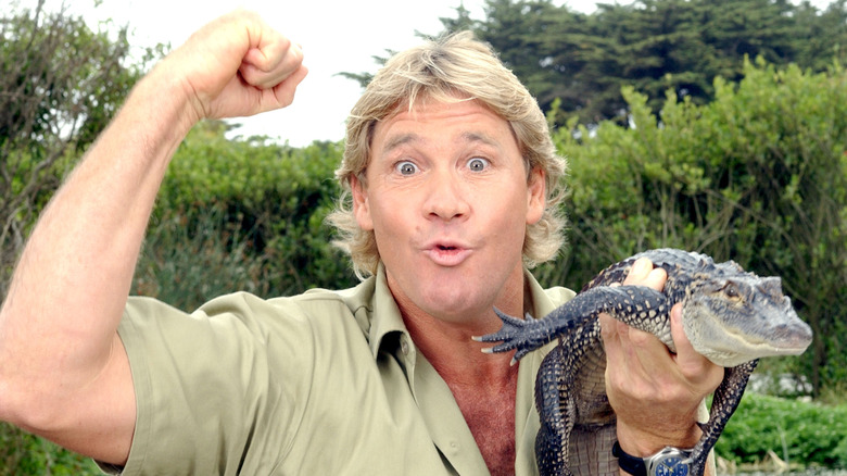 Steve Irwin holding an alligator